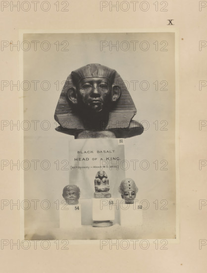 Four Egyptian objects, including a fragment of a sculpture, the head of a pharaoh and a sculpture