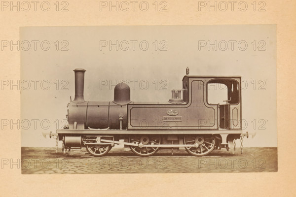 Steam locomotive for passenger transport made by Sharp, Stewart and Company, photograph, page,