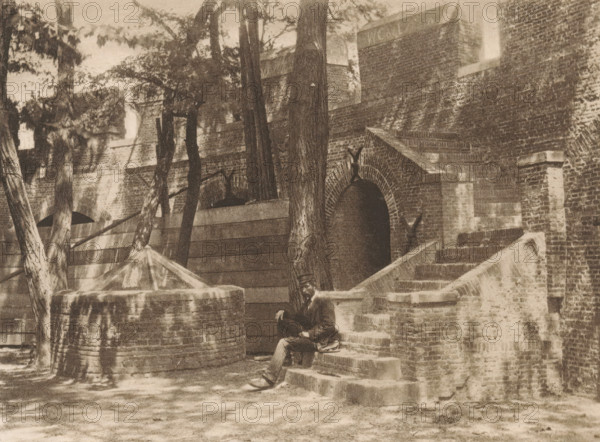 Inside of the Castle of Leiden, page, photomechanical print, title: 'Courtyard of the Burg, Leiden