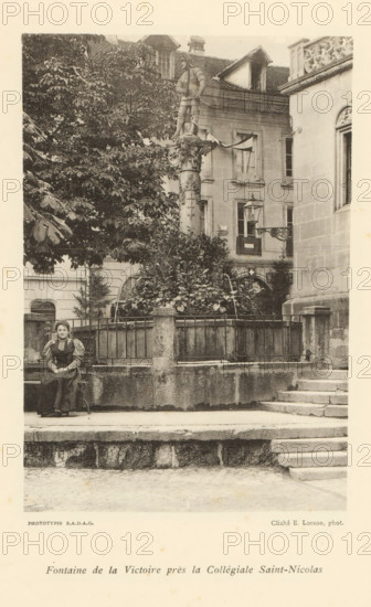 View of a fountain in Fribourg, Fontaine de la Victoire près la Collégiale Saint-Nicolas, page,