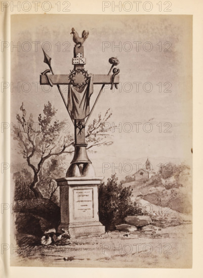 Photo reproduction of a drawing of a cross with references to the Passion of Christ outdoors,