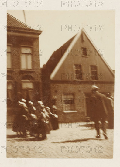 Children in traditional costume, photograph, possibly in Volendam (blurred image). Part of the