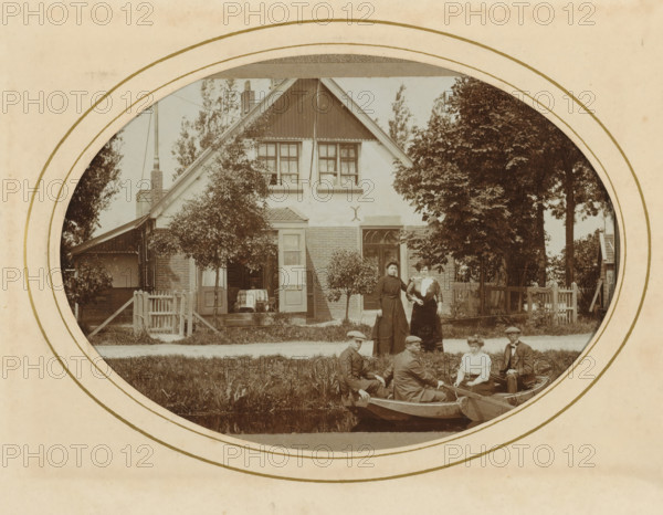 Three men and a woman in a rowboat and two women on shore, with a house in the background, album