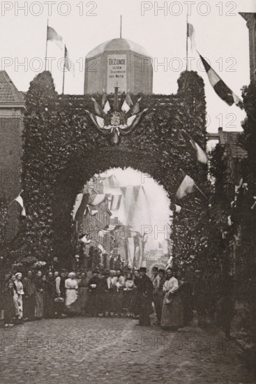 Willemstraat., Triumphal arch in the Willemstraat during the April festivities in 1887 in