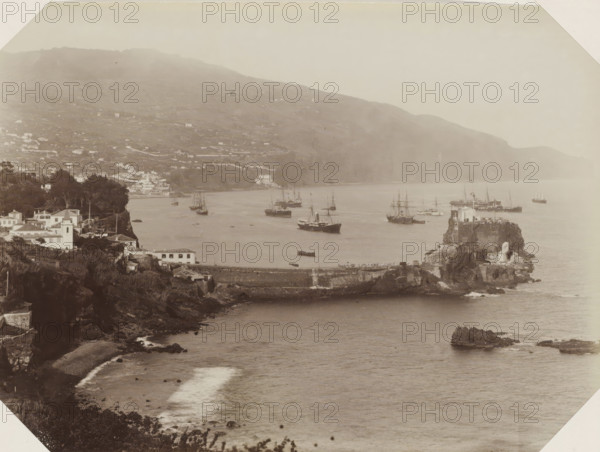 View of the coast and a harbor pier of Madeira, photograph, Part of Album with 191 photos of a trip