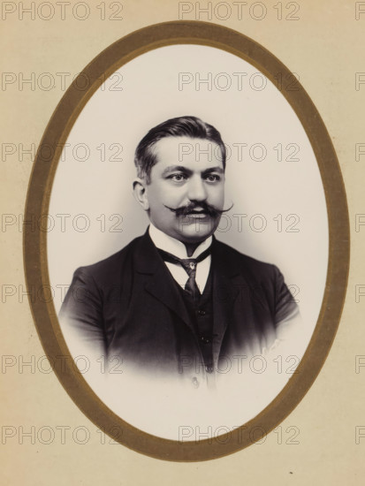 Portrait of a man, album cover, photograph, cabinet photograph, This photo is part of an album.,