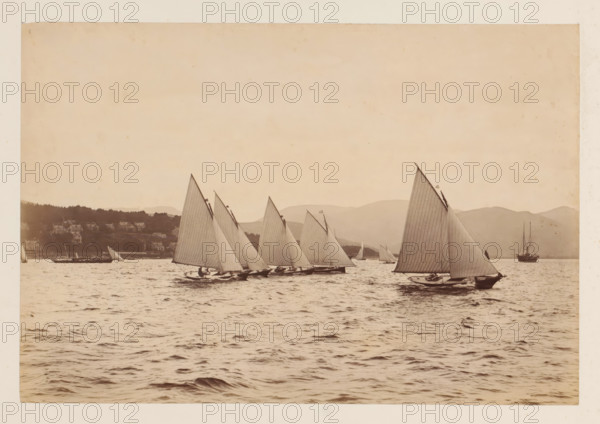 Various sailing ships on the water with a hilly landscape in the background, album page,