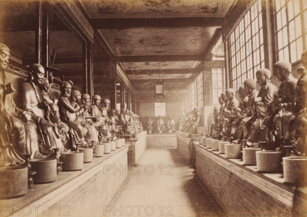 Interior of the Hualin Temple of Guangzhou with statues, photograph, annotation: 'Canton-Part of