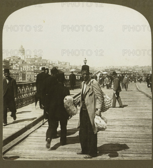 Galata, the Foreign part of Constantinople, from the Outer Bridge, Fan seller on the Galata Bridge