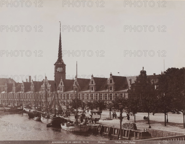 Børsen on Slotsholmen in Copenhagen, left of center the Dragespiret, Børsen, Kjøbenhavn og Omegn,