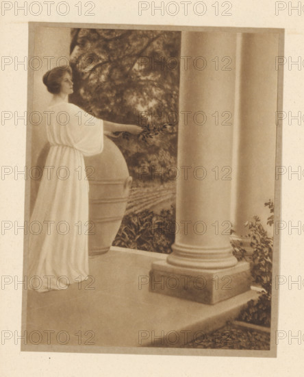 Woman with laurel branch at a temple, page, photomechanical print, copyright notice: 'C', maker: