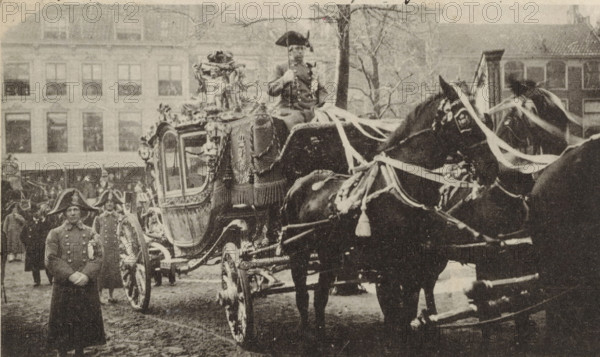 The golden coach of the wedding procession of Wilhelmina, Queen of the Netherlands, and Hendrik of