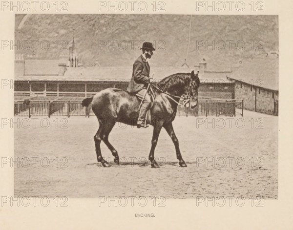 Backing, Man on a horse walking backwards, page, photomechanical print, photographer: Alexander