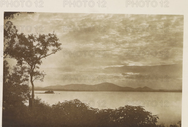 View of the water reservoir at Minneriya, Sri Lanka, page, photomechanical print, title: 'MINNERIA