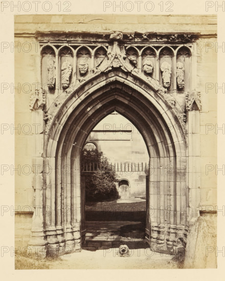 Portal of the ruins of Melrose Abbey, photograph, page, title: 'Richly molded Gothic portal',