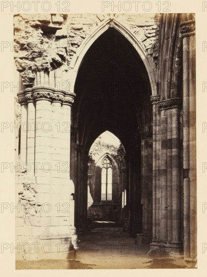 View of an aisle of the ruins of Melrose Abbey, photograph, page, title: 'Fine perspective view of