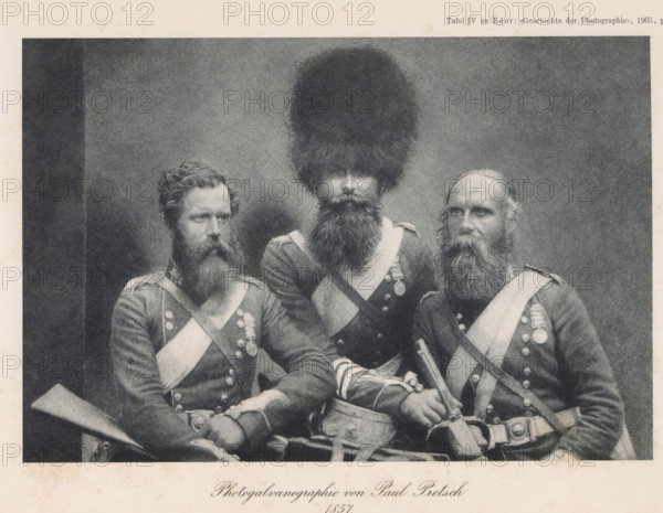 Portrait of three unknown men in uniform, page, photomechanical print, number: 'Tafel IV',