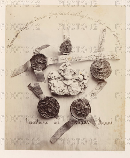 Family coat of arms and seal of the Gensfleisch family and seals of the Fust and Schöffer families,