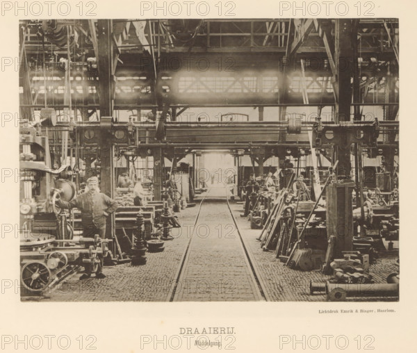 Interior with employees of the machine factory of Gebroeders Stork & Co., Turning Shop. Central