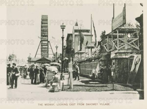 View of a street with national pavilions and a Ferris wheel at the World's Columbian Exposition in