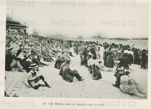 On the beach.- East of Manufactures Building, People watching ships from a quay during the World's
