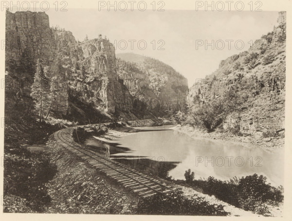 View of the Rio Grande with rock walls in Colorado, Echo Cliffs, Colorado - Denver & Rio Grande RR,