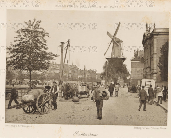 Rotterdam, View of a street in Rotterdam, with a mill in the background, page, photomechanical