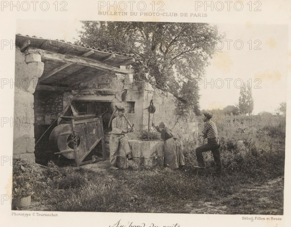 At the well, Two men and a woman around a well, page, photomechanical print, inscription: 'Bulletin