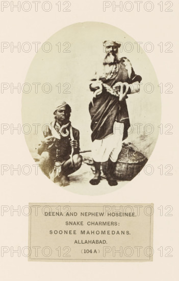 Portrait of Deena and his cousin Hoseinee, two snake charmers from Prayagraj, Uttar Pradesh, India,