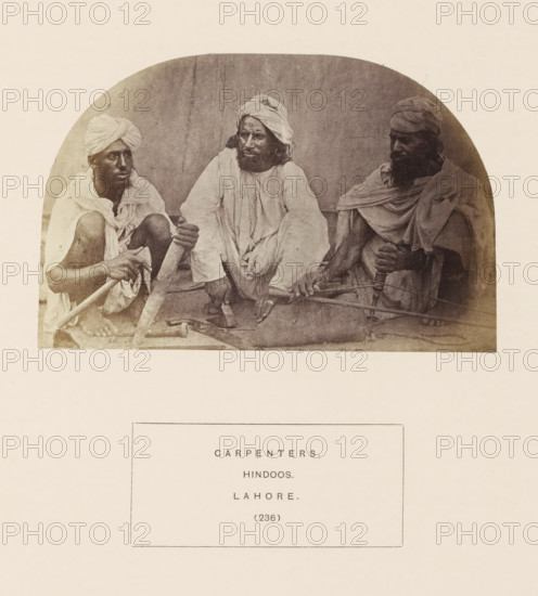 Portrait of three unknown carpenters with tools from Lahore, Punjab, Pakistan, photograph, page,
