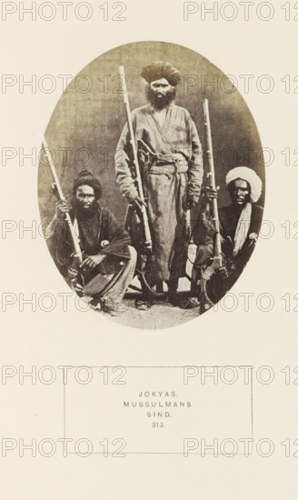 Portrait of three unknown men from the Jokhio Sindhi tribe in Sindh, Pakistan, photograph, page,