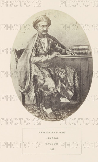 Portrait of Rao Krishn Rao, a pundit from Sagar at a reading table, Madhya Pradesh, India,