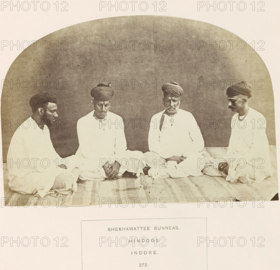 Portrait of four unknown merchants originally from Shekhawati, Rajasthan, based in Indore, Madhya