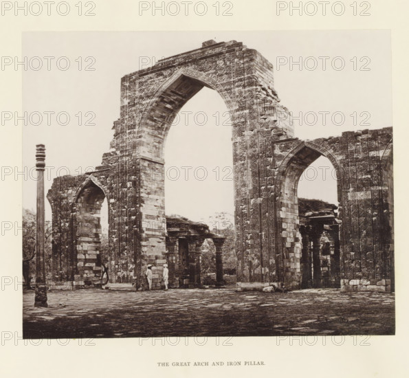 View of a gate and pillar at the Qutb complex in Delhi, The great arch and iron pillar, page,
