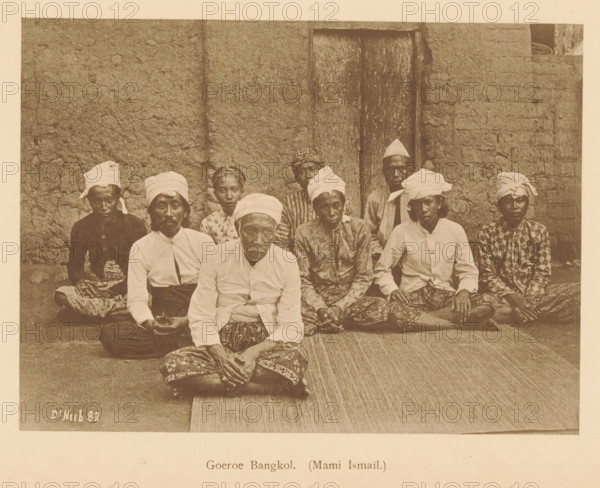 Guru Bangkol. (Mami Ismail), Group portrait of nine unknown men, page, photomechanical print,