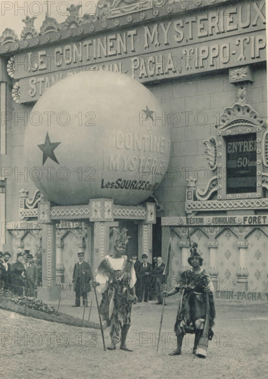 Two men in front of a diorama at the Antwerp World Exhibition in 1894, Le Continent mistérieux,