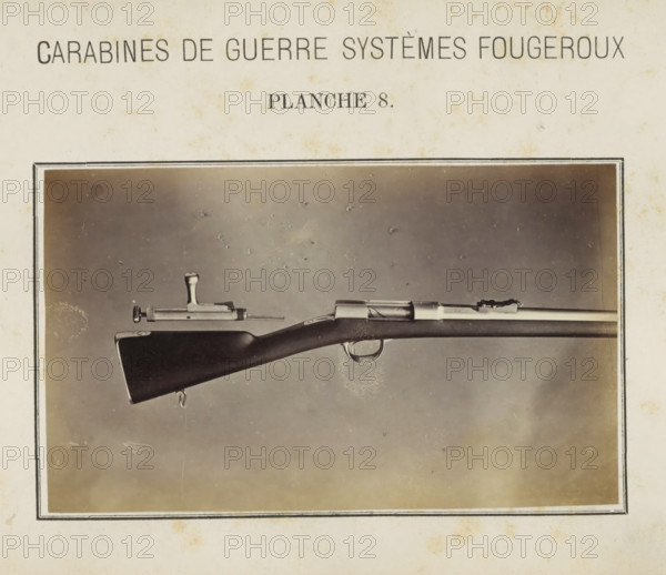 Part of a rifle and a loose safety catch, photograph, page, number: 'Planche 8.', inscription:
