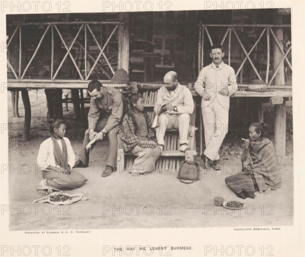 The way we learned Burmese, Three men with books and three women from Burma in front of a house,
