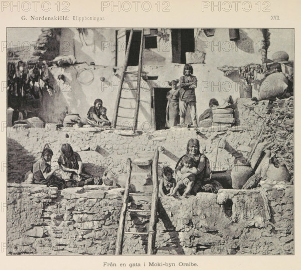 View of a village of the Hopi people, Moki-byn Wol'-pi, page, photomechanical print, name, number: