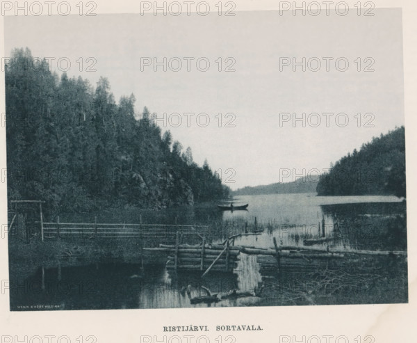 Ristijärvi . Sortavalan, View of a canoe on water, page, photomechanical print, photographer: Impi