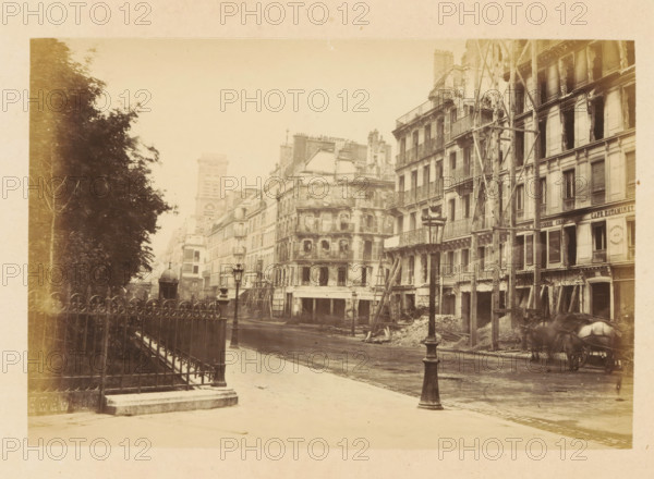 View of destroyed buildings on Rue St Martin, Rue St Martin, photograph, page, Paris, 1871,