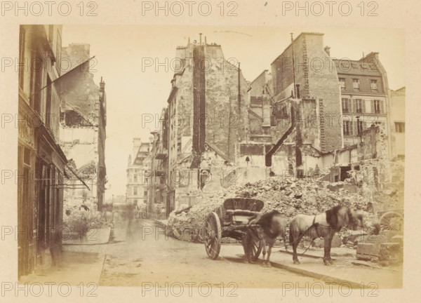 Rue du Bac & Rue de Lille, View of a horse cart in front of destroyed buildings the Rue du Bac and