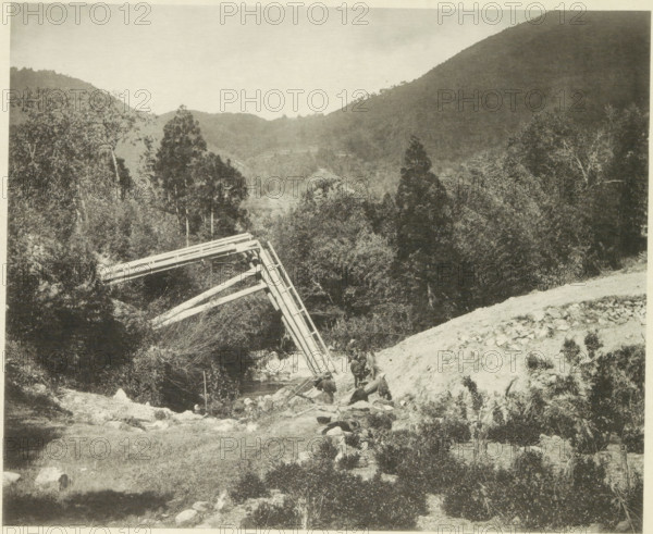 Destroyed bridge in the Neo Valley in Japan after an earthquake, page, photomechanical print,