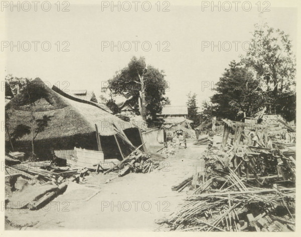 Destroyed buildings along the road to Gifu, page, photomechanical print, Japan, cliché maker: