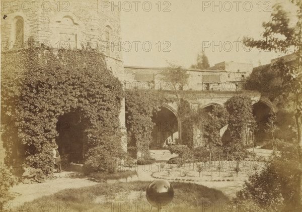 View of the cloister of the ruins of St. Bavo's Abbey in Ghent, Bruges, photograph, page,