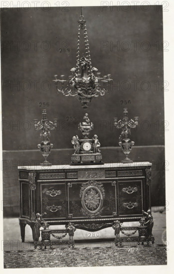 Chest of drawers with a clock and two candlesticks in Louis XVI style, page, photomechanical print,