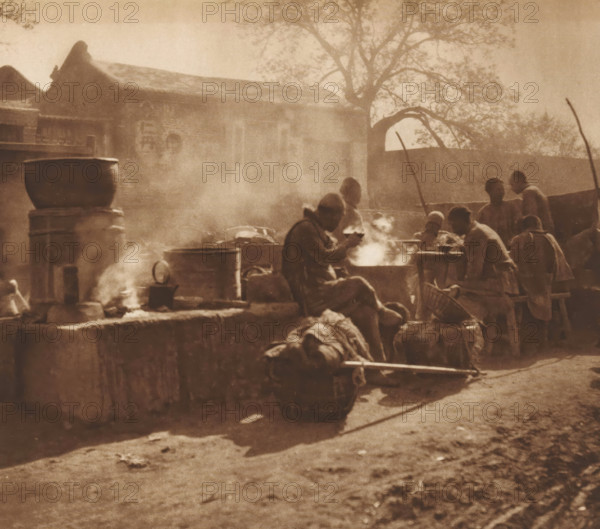 Unknown eating men, page, photomechanical print, photographer: Donald Mennie, Beijing, cliché