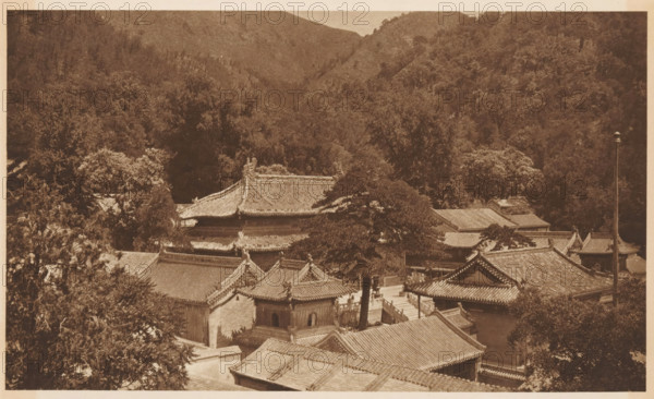 View of a landscape with mountains and roofs, page, photomechanical print, photographer: Donald