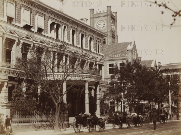 Exterior of the Hong Kong-Shanghai Bank on the Bund in Shanghai, album page, photograph, Part of