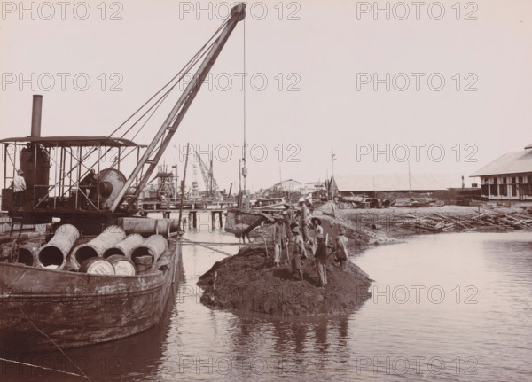 Closing of the dam around the construction pit, Belawan Ocean Harbor, photograph, Closing the dam